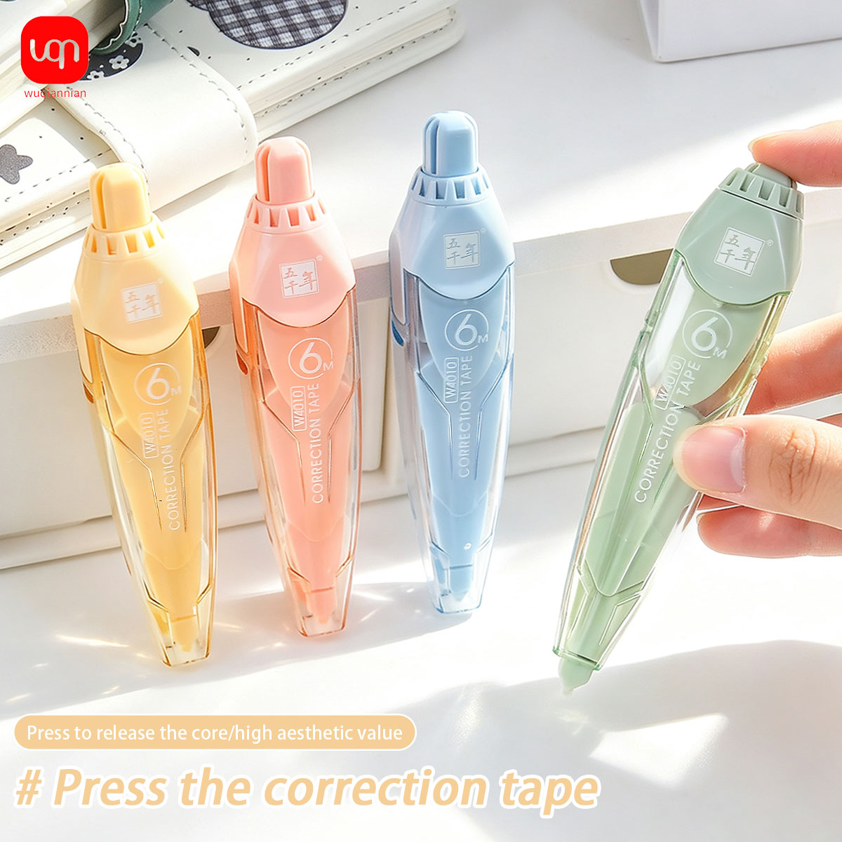Correction Tape Roller - 6mの修正テープ、押しボタン式ペン型、パステルカラー、引き込み式、滑らかな書き心地、学校やオフィスで使える文房具。